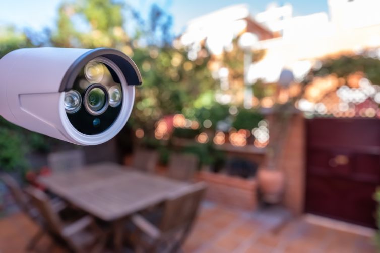 Security,Camera,Installed,In,The,Garden,Of,A,House,For